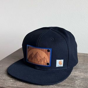 Carhartt flat bill mountain engraving.